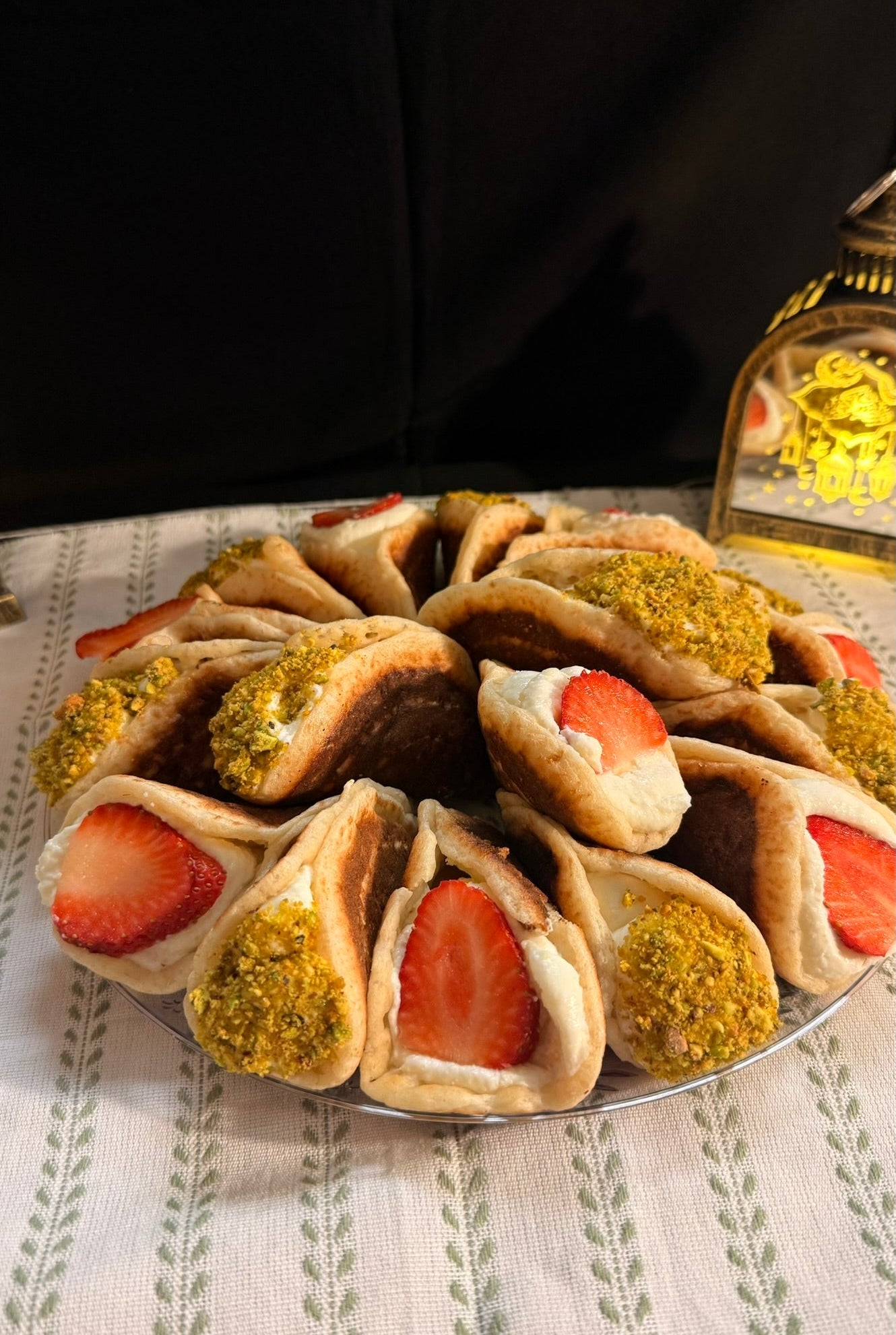 The Qatayef Plate – 18 cream-filled qatayef in pistachio and strawberry pistachio flavors from Pistaché Bakery